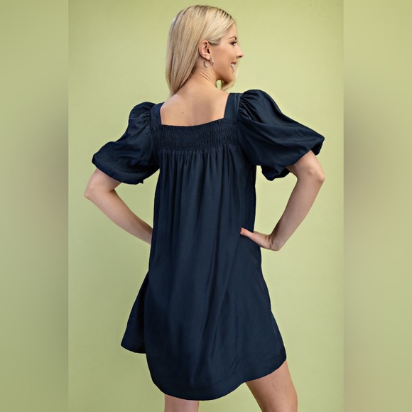 Short Puff Sleeve Mini Dress with a Large Bow Detail On Front - Picture 6 of 9